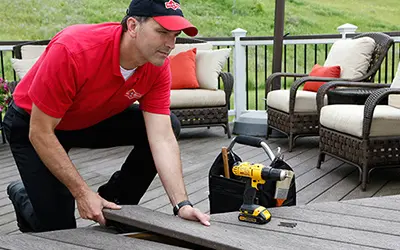 A My Handyman technician repairing a deck.